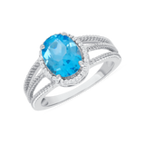 Ladies Oval Blue Topaz & Diamond Halo Split Sides Ring